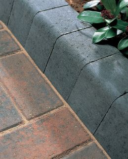 Large kerb for block paving in charcoal